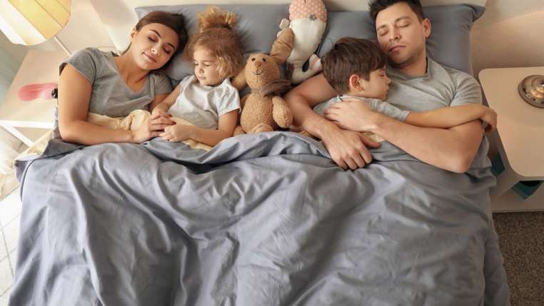 family-in-bed